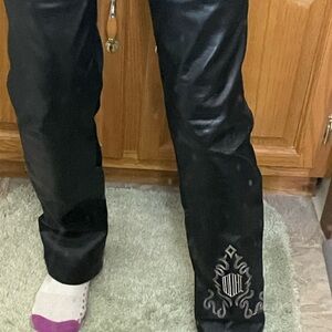 These are Harley Davidson leather pants with nice detail. Size 8. Like new.